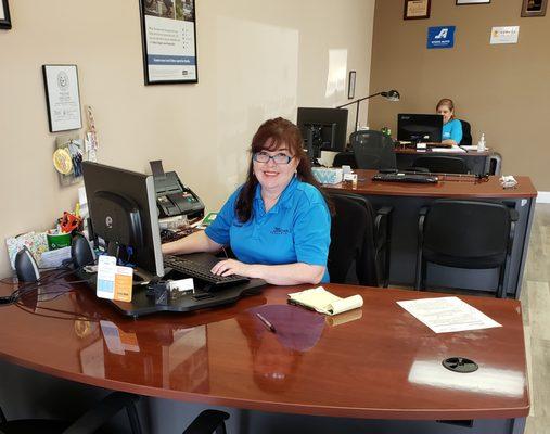 Elizabeth and Lucy helping auto insurance customers in Laredo, TX