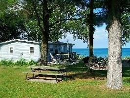 Cottage 1 is lakefront, has 3 bedrooms and sleeps 8