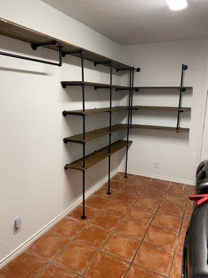 Pantry and laundry shelves along with kitchen shelves.