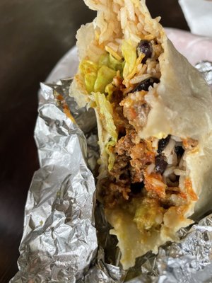 10" Regular Burrito. Spice carne asada, all veggies no onion, hot sauce, and guacamole.