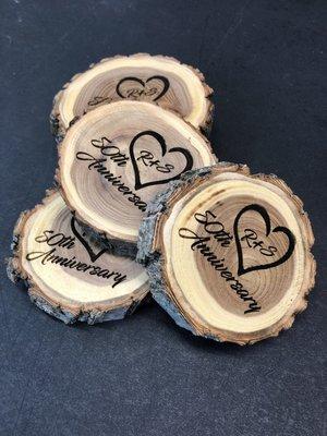 Sample of laser engraved wood coasters.