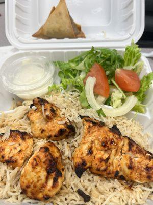 Chicken Sheesh Tawouk (Botti )Over Rice with salad and beef sambusa!