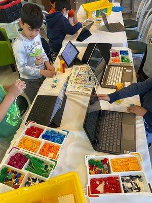 Coding with scratch, and applying it to LEGO building