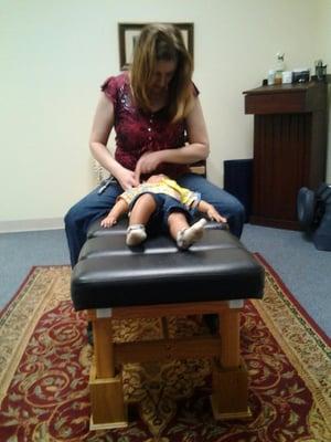 My toddler getting adjusted by Dr Kristen.