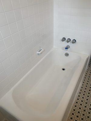 Tub and tile walls refinished in white