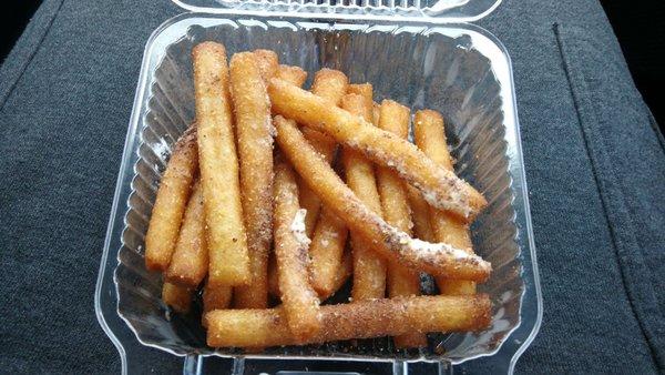 Churro Fries with powdered sugar and cocoa powder.  Awesome.