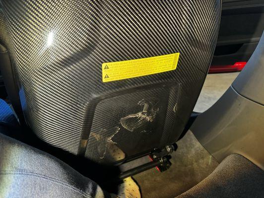 Negligent installers muddy foot prints on my new carbon bucket seats.