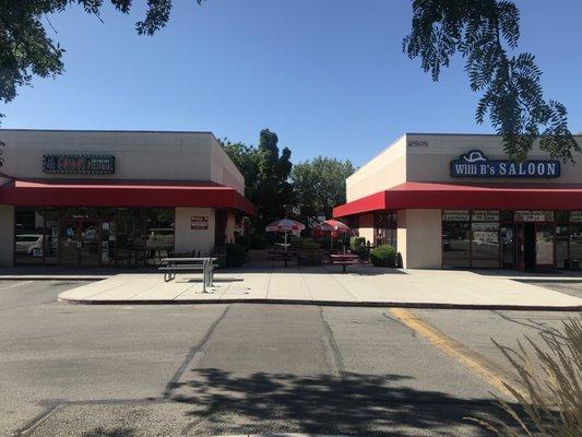 Our office is in the walkway between two strip malls, behind Guido's Pizza.