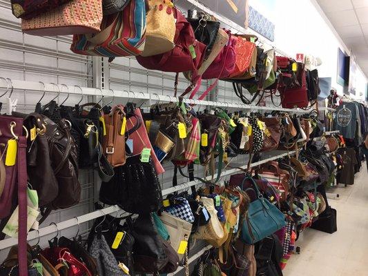 Purses hung on hangers