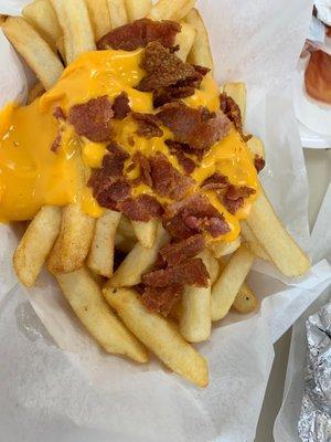 Yeah def not coming back here again. What is this?? Bacon cheese with fries and they crush one bacon strip. This place is not cheap also.