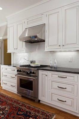 Award-winning Kitchen remodel in Charlotte, NC with Wolf range and custom cabinets by Distinctive Design / Build / Remodel.