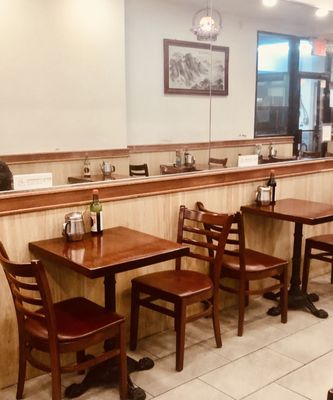 Hardworking staff is always cleaning, wiping the tables and sweeping the floor to make their noodle shop absolutely spotless.