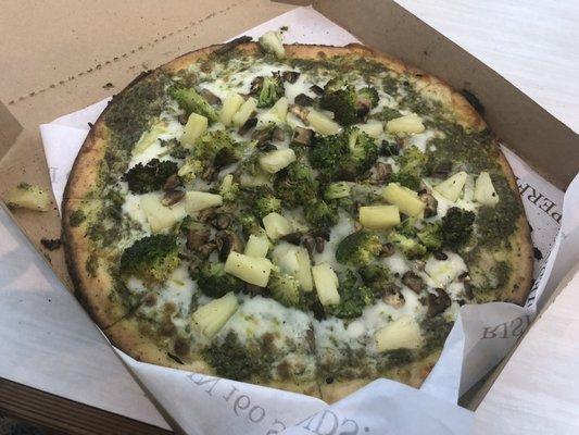 Gluten free pesto, broccoli, mushrooms and pineapples pizza (looks good on top)