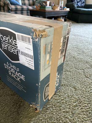 I received This taped up damaged  box