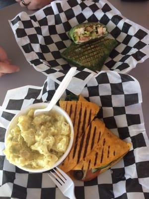 Chicken Club in spinach wrap & Veggie in jalapeño cheddar wrap - both panini pressed. Large homemade potato salad. Yum!