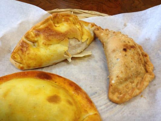 Spicy Chicken, Guava and Cheese, and Beef Empanadas. (From top-left going clockwise)