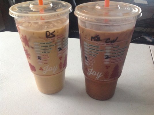 Large iced coffee (pumpkin spice on the left and mocha coconut on the right - cream and two sweetnlow in both)