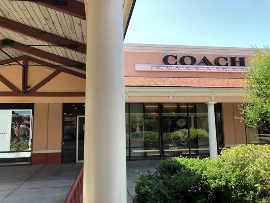 Coach storefront.