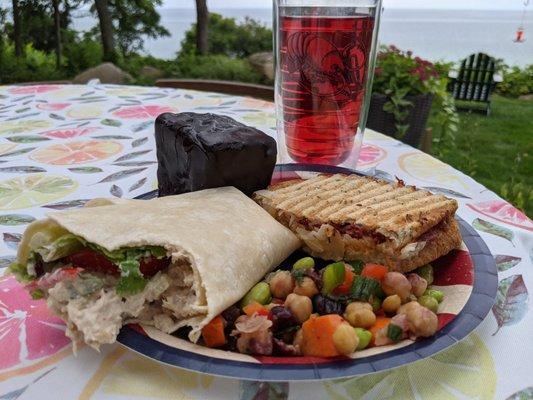 Tuna wrap, classic panini Reuben, chickpea and edamame salad, and a HOMEMADE DING DONG for dessert, with cliffside ocean view