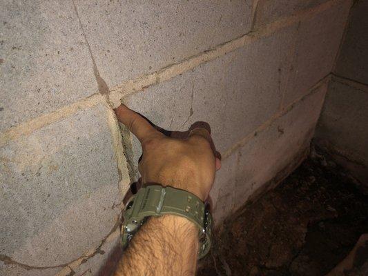 Finger sized crack in crawlspace