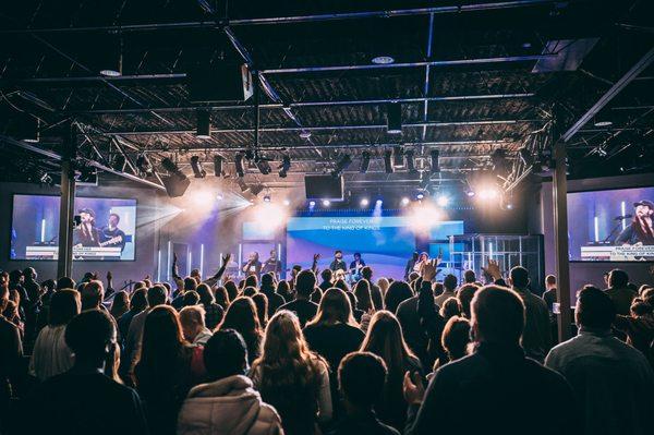 People worshiping at Mercy Hill's Regional Campus.