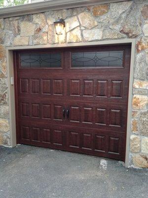 residential garage door in mahogany color