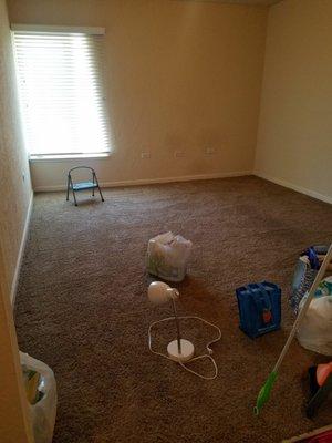 Living room of 1bed/1ba unit from the hallway, across from kitchen. Ignore our moving out mess :)