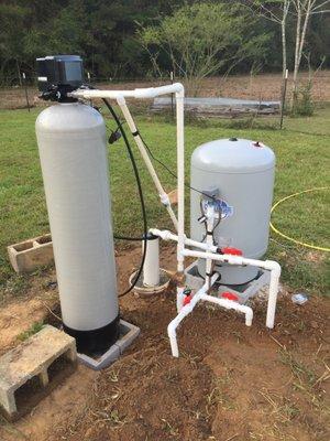 4 inch well with submersible pump, pressure tank and water filtration system