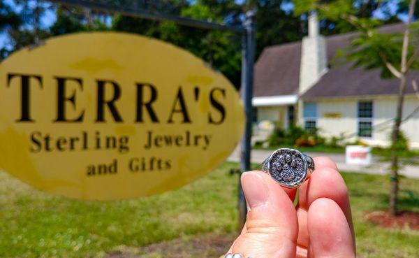 A ring I purchased and her outside signage