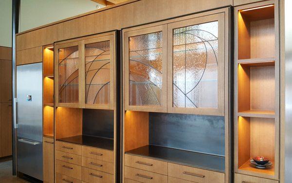 custom kitchen cabinetry in leaded stained glass, using a variety of clear textured glass.