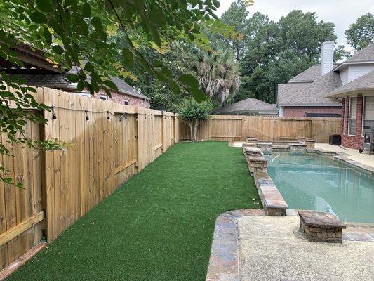 New artificial turf and landscaping.