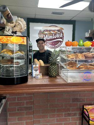 Here's a photo of the sandwich shop with the owner. Mike is the nicest guy and the food is fantastic. Definitely worth checking out!