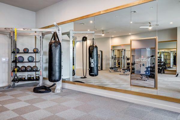 24-hour fitness center with state of the art fitness equipment, TRX system, and Echelon touch mirror