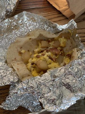 1 egg, 1/2 bacon strip, 5 piece of potato, no cheese, mini tortillas