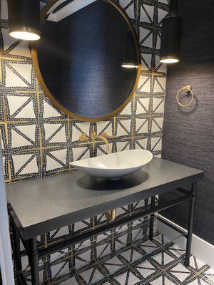 Dramatic bathroom with intricate tile work