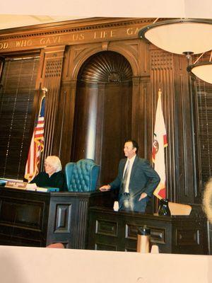 Mom Judge Carol Koppel swearing in attorney son Senn Koppel.