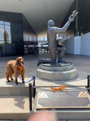 Snacks dawning Orange at astronaut Michael Anderson memorial statue in RiverFront Park