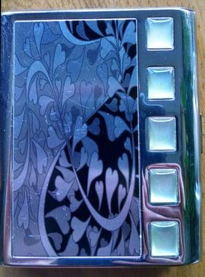 I bought this cool cigarette case at Tobacco King for $12.