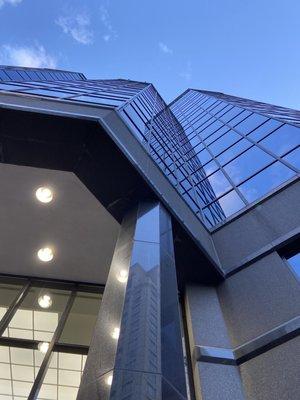 Main Street Tower all glass exterior that is maintained by Valcourt building services.