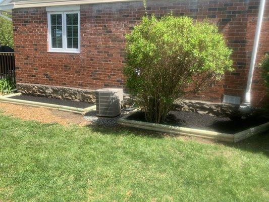 Installation of fresh mulch, rock, and beds