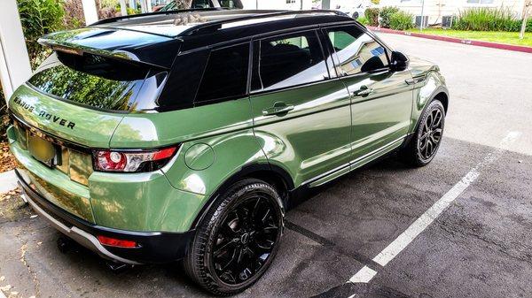 Wrapped in glossy military green, glossy black on the hood, and glossy black powder-coated wheels.