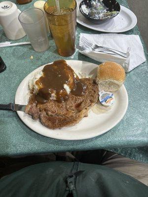 Ribeye steak mashed with gravy