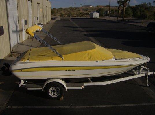 Custom Cockpit and bow boat cover. Snap down. Sunbrella Marine Fabric.