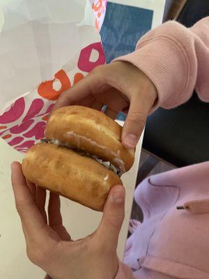 Vanilla and chocolate donuts pressed together