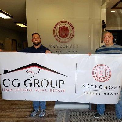 Bill and I showing off our new banner