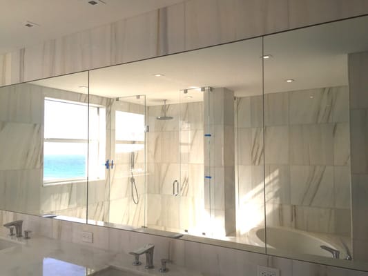 Mirrtique, Inc. Glass & Mirror Co. Furnished and installed these custom mirrors between Marble, in a Delrey Beach Condo.