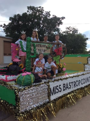 Queen Team enjoying a local parade.