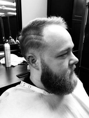 Artistic haircuts and beard trims