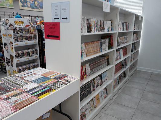 Manga on the shelves, pre-owned manga in the table. Part 1