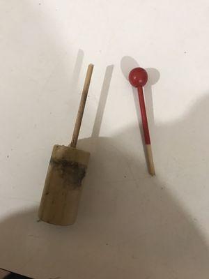 Broken cork and stick bobber.